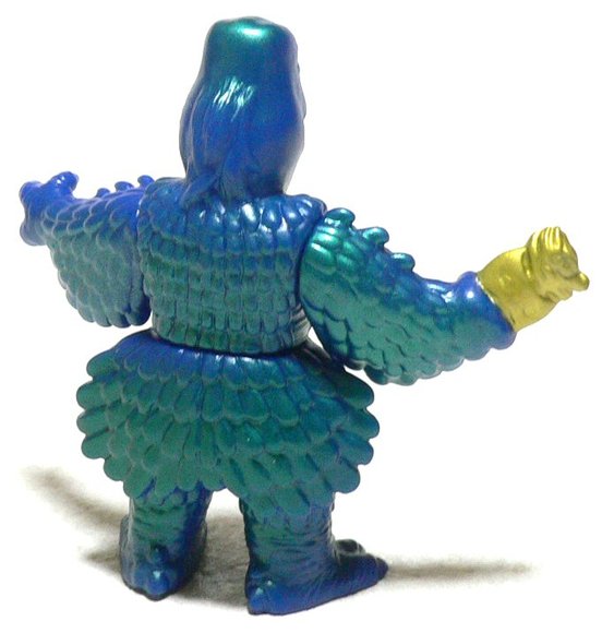 Daimon figure, produced by Tomy. Back view.