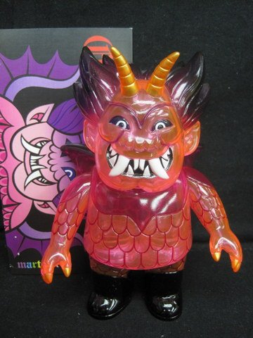 Ojo Rojo - Clear Pink figure by Martin Ontiveros, produced by Gargamel. Packaging.
