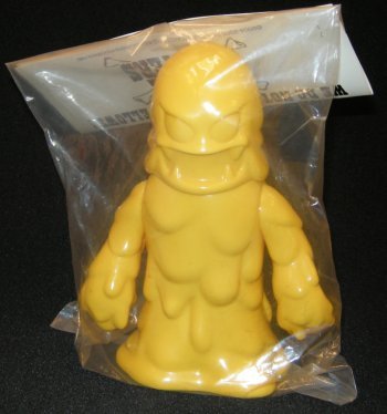 Damnedron - Unpainted Yellow  figure by Rumble Monsters, produced by Rumble Monsters. Packaging.