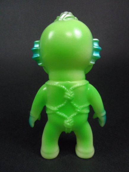 Drunk Seijin - GID figure by Katope, produced by Super7. Back view.