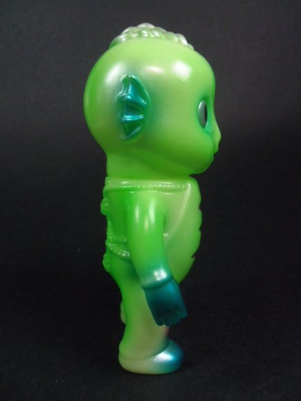 Drunk Seijin - GID figure by Katope, produced by Super7. Side view.