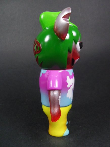 Le Turd figure by Le Merde, produced by Super7. Side view.