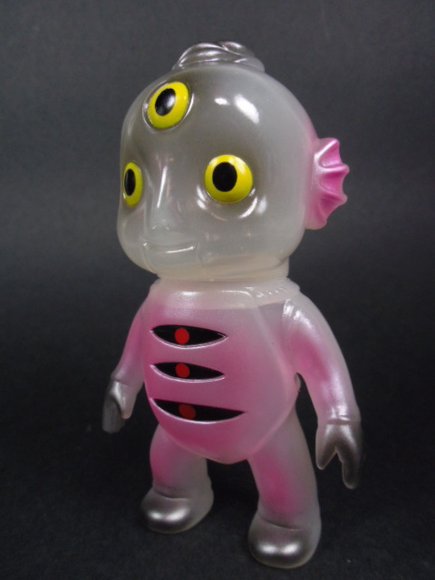 Milky Drunk Seijin figure by Katope, produced by Super7. Side view.