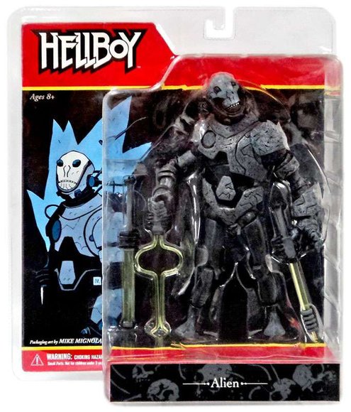Alien figure by Mike Mignola, produced by Mezco Toyz. Packaging.