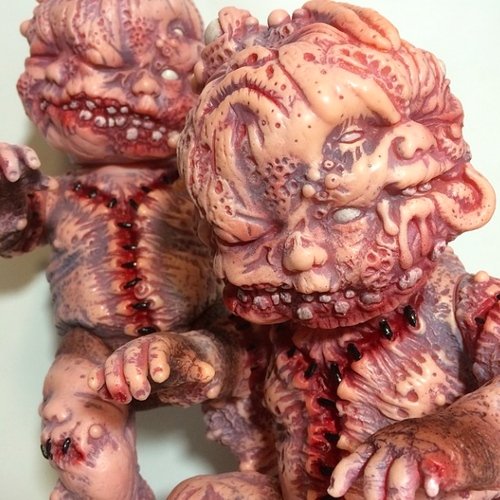 Autopsy Zombie Staple Baby figure by Jeremi Rimel, produced by Miscreation Toys. Front view.