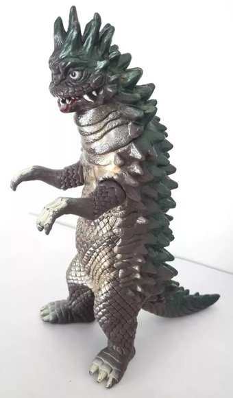 Bemular figure, produced by Bandai. Side view.