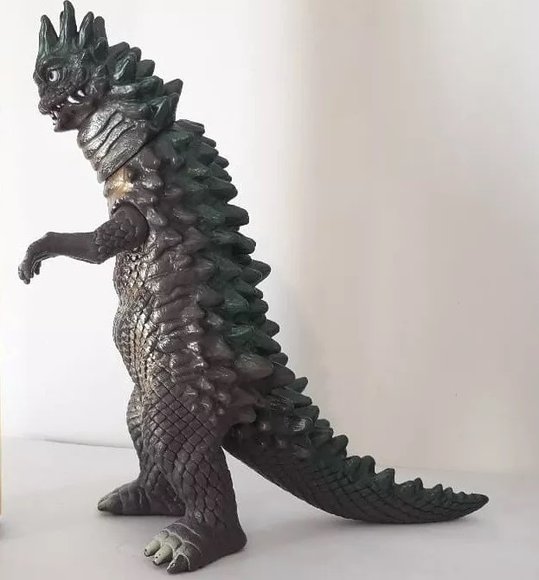 Bemular figure, produced by Bandai. Side view.