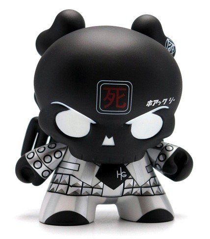 Black Skullhead 8” Dunny figure by Huck Gee, produced by Kidrobot. Front view.