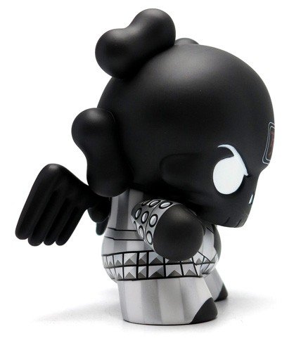 Black Skullhead 8” Dunny figure by Huck Gee, produced by Kidrobot. Side view.