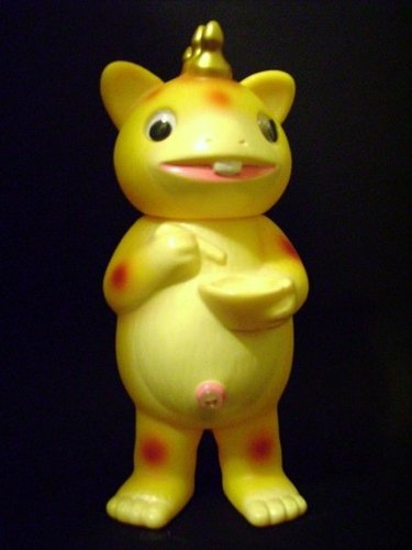 booska figure, produced by Us Toys. Front view.