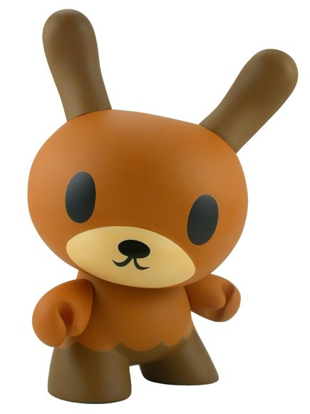 Brown Little Inky figure by David Horvath, produced by Kidrobot. Front view.
