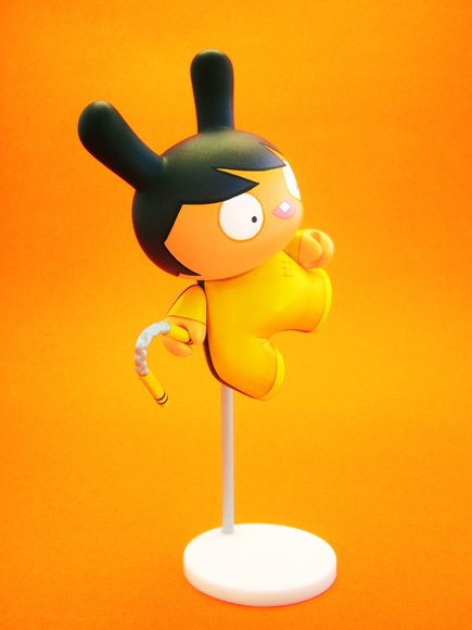 Bruce Lee Dunny figure by Dolly Oblong. Side view.