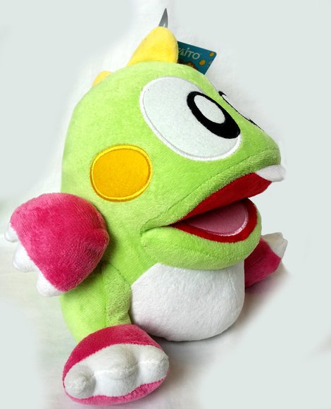 Bubble Bobble Bub figure by 1Up2Up, produced by Unbox Industries. Side view.
