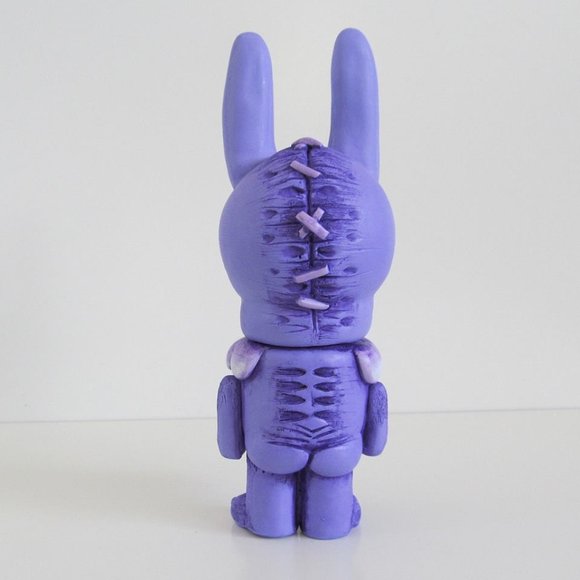 Bun Bun - Purple figure by Brent Nolasco. Back view.