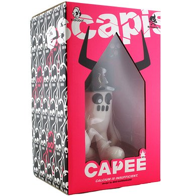 capee figure by Mad Barbarians, produced by Kidrobot. Packaging.