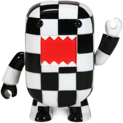 Checkerboard Domo Qee figure by Dark Horse Comics, produced by Toy2R. Front view.