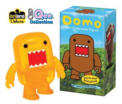 Clear Yellow Domo Qee (SDCC 2009) figure by Dark Horse Comics, produced by Toy2R. Packaging.