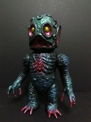 Crater Man figure, produced by Skull Head Butt. Front view.