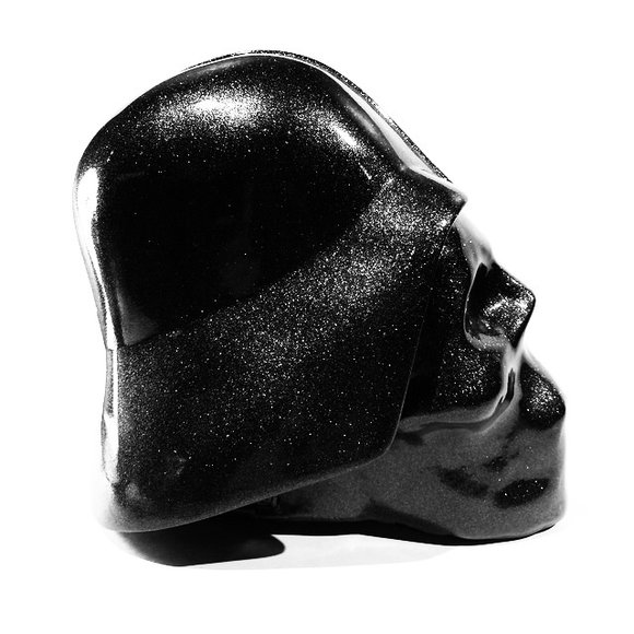 Death Vader figure by Arnold Austria, produced by Ins - Imagine Nation Studios. Side view.