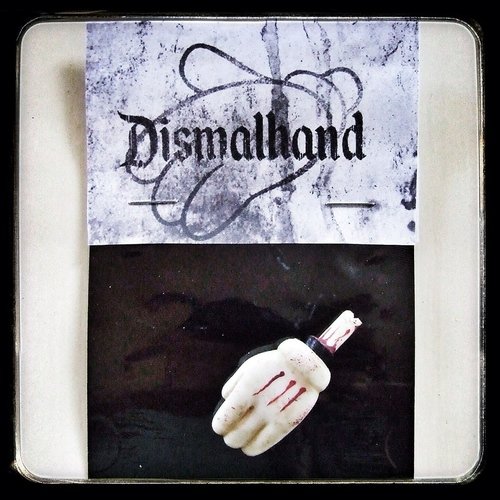 Dismalhand figure by Dms. Packaging.
