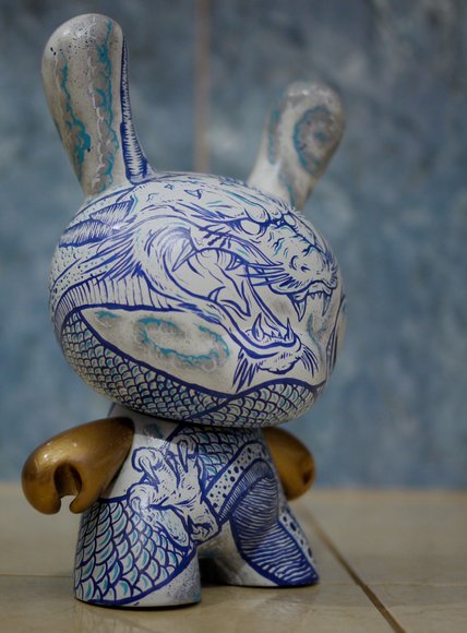 Dragon Dunny figure by Mr. Lister, produced by Kidrobot. Side view.