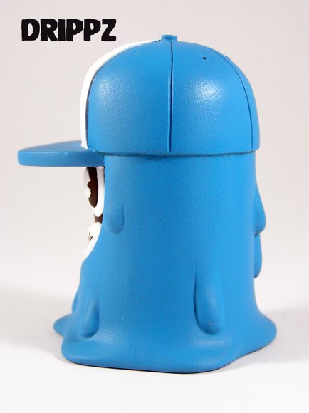 Drippz Turquoise figure by Lisa Rae Hansen, produced by Ibreaktoys. Side view.