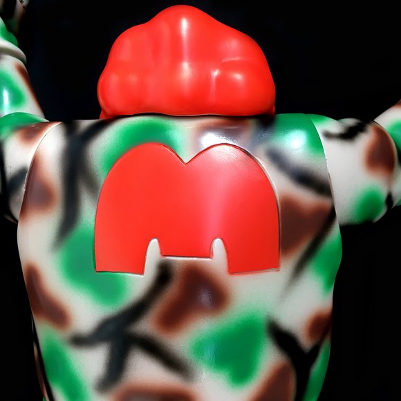 EVIL MC Camo figure by Ron English, produced by Blackbook Toy. Back view.