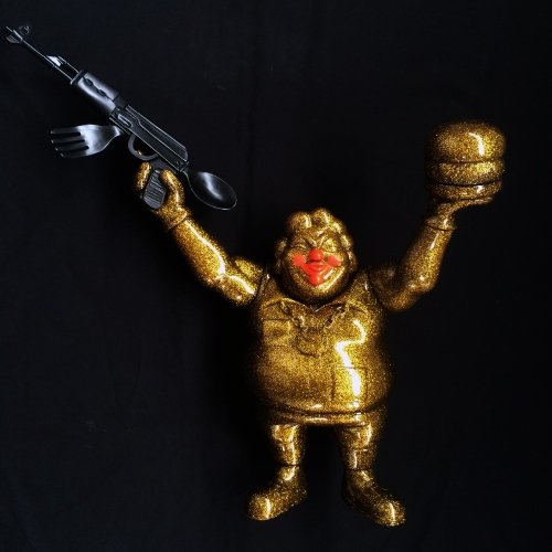 EVIL MC Hella Bling figure by Ron English, produced by Blackbook Toy. Front view.
