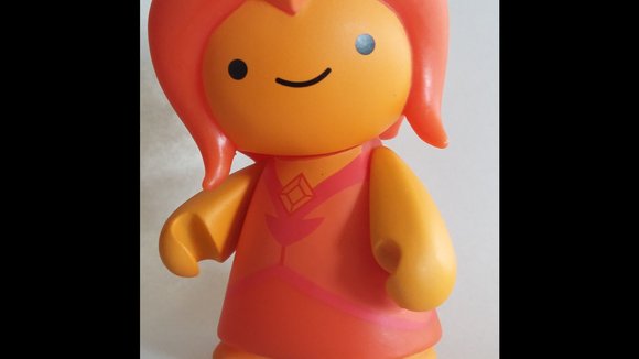 Flame Princess figure by Adventure Time X Kidrobot, produced by Kidrobot. Detail view.