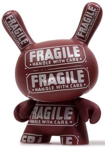 Fragile Handle With Care figure by Andy Warhol, produced by Kidrobot. Front view.