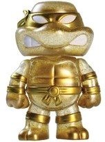 Gold Glitter Teenage Mutant Ninja Turtle figure by Nickelodeon, produced by Funko. Front view.