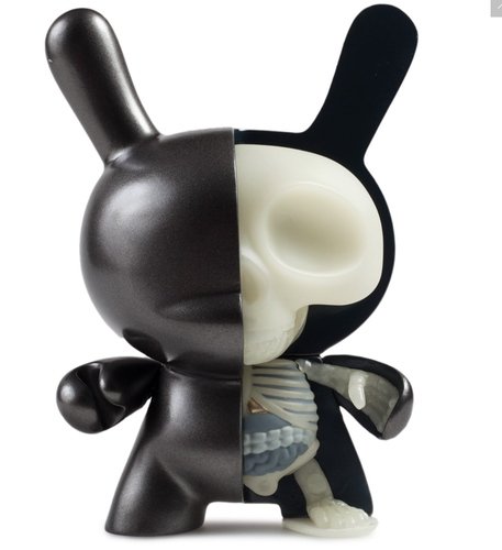 Half Ray Dunny GID figure by Jason Freeny, produced by Kidrobot. Front view.