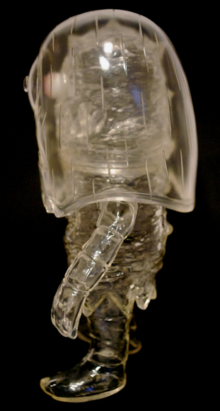 Helper - Clear figure by T9G X Tim Biskup, produced by Intheyellow. Side view.