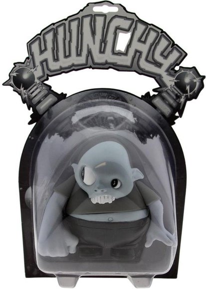 Hunchy Mono figure by Philip Ramirez, produced by Suspect Toys. Packaging.