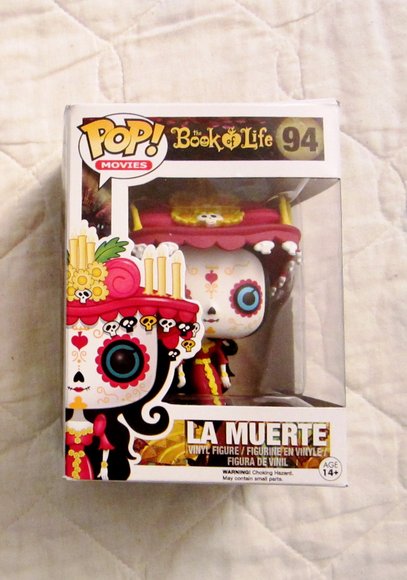 La Muerte figure, produced by Funko. Packaging.