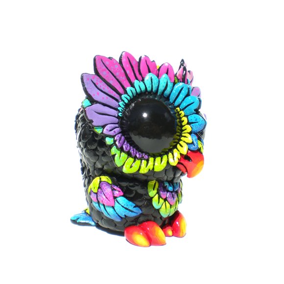 Medee Owl - Rainbow figure by Kathleen Voigt. Side view.