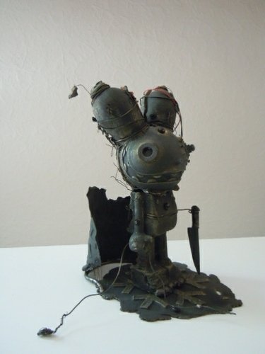 Metal in the head figure by 23Spk, produced by Kidrobot. Front view.