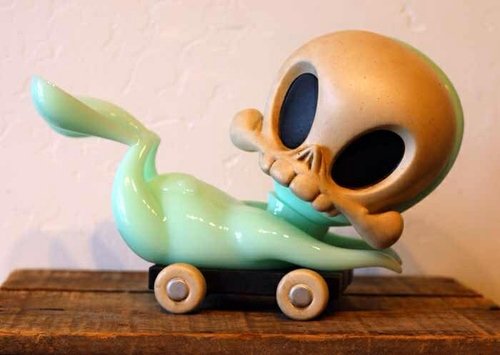 Milk Glass Mint Pull Cart Skelve figure by Brandt Peters X Kathie Olivas, produced by Circus Posterus. Front view.