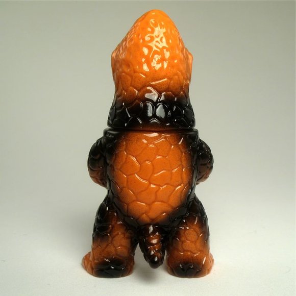 Mini Zagoran - Orange, Black figure by Kiyoka Ikeda. Back view.