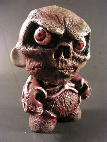 Mort figure by Monsterforge, produced by Kidrobot. Front view.
