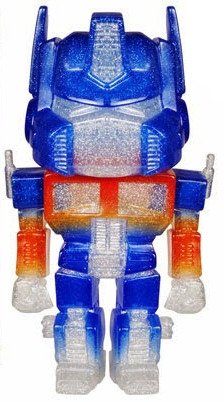 Optimus Prime - Clear Glitter figure by Funko, produced by Funko. Front view.