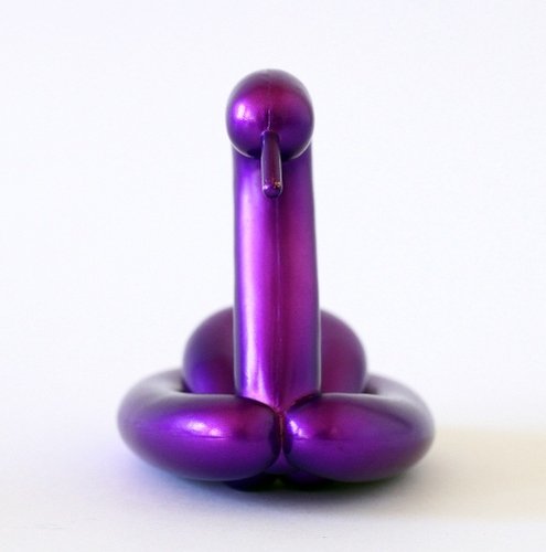 Purple Swan figure, produced by Kidrobot. Front view.