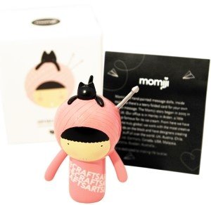 Purrl figure by Esther Chaye, produced by Momiji. Packaging.