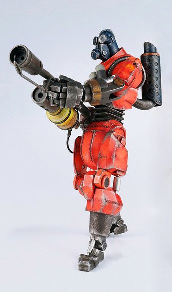 ROBOT PYRO RED figure by Ashley Wood, produced by Threea X Valve. Front view.