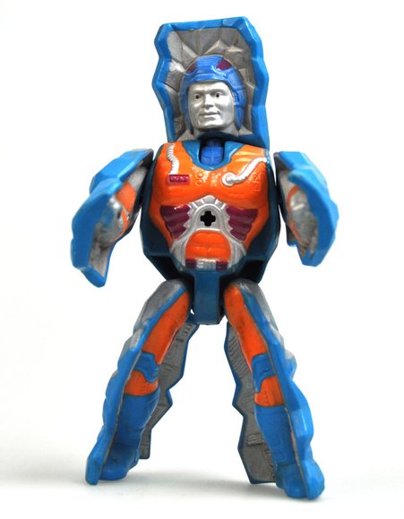 Rokkon figure, produced by Mattel. Front view.