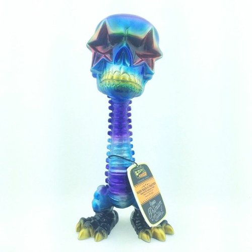 Ron English Hikari Star Skull Rainbow figure by Ron English, produced by Funko. Front view.