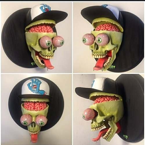 Sc skull figure, produced by Br1 Monsters. Front view.