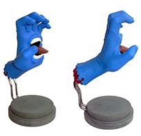 Screaming Hand figure by Jim Phillips, produced by Made By Monsters. Side view.