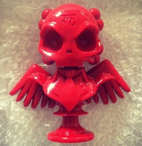 Shiny Red Skullhead Bust figure by Huck Gee. Front view.