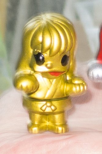 Sister Mayo Karate Style mini sofubi (gold) figure by Art Junkie, produced by Rampage Toys. Front view.